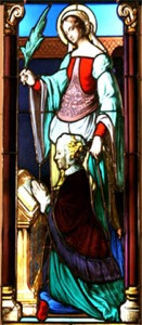 Vitrail de l'église Saint-Martin de l'Isle-Adam, représentant Sainte-Reine et la donatrice du vitrail en prière
